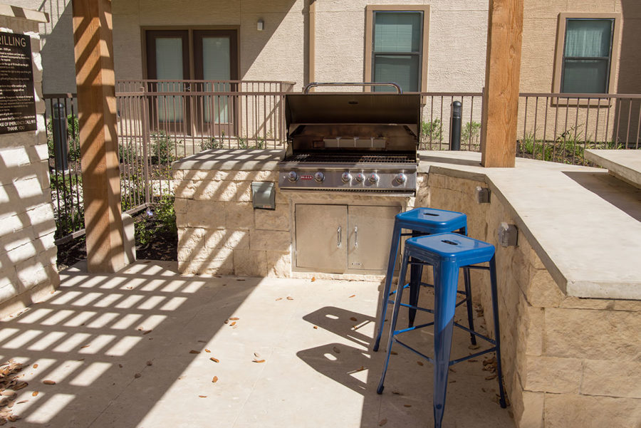 outdoor grilling area at prado student living apartments